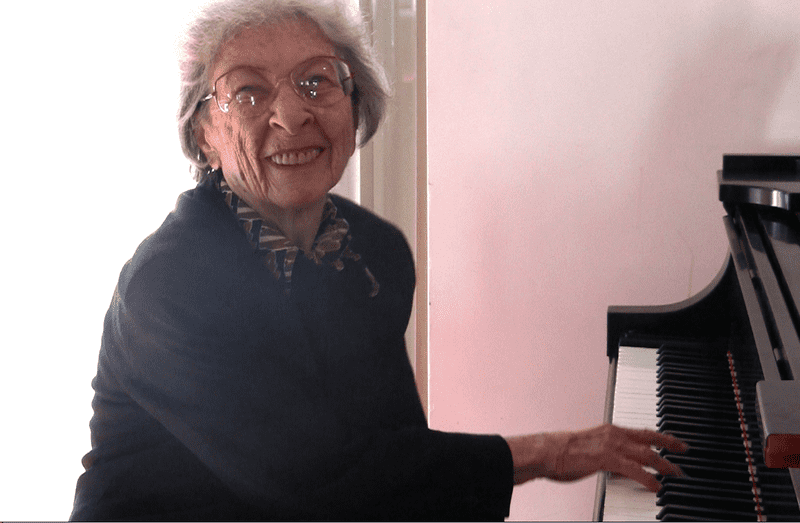 Harriet Wingreen at the piano.
